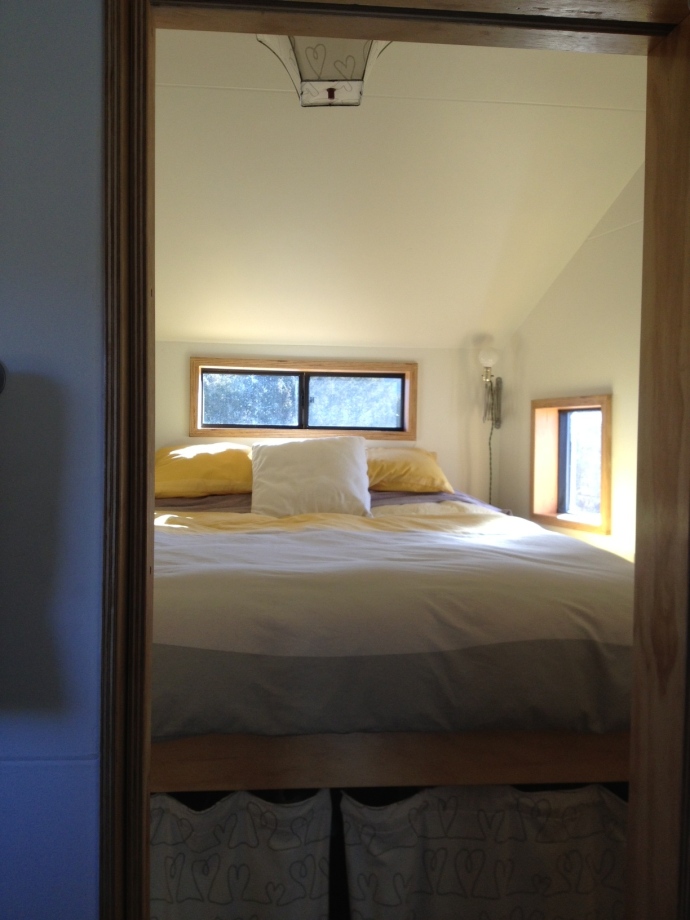 Tiny House bedroom: yellow and gray duvet cover.